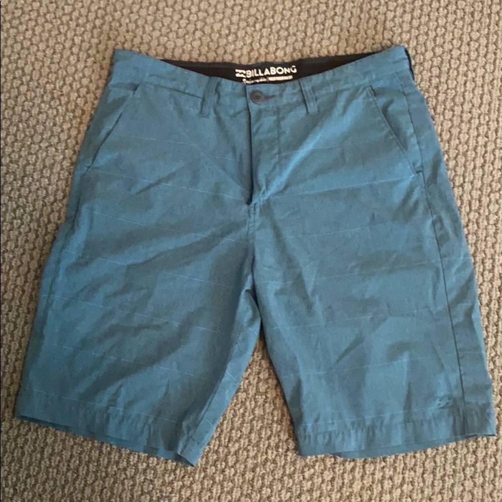 Men’s Billabong teal shorts size 32.